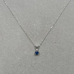 0.03 Cts Diamond & 0.59 Cts Blue Sapphire Pendant in 18K White Gold