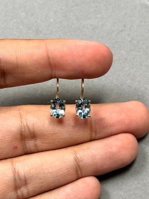 Oval Aquamarine Stud Earrings | 8x6 mm AA Quality Scroll Lever Back in 14K Yellow Gold