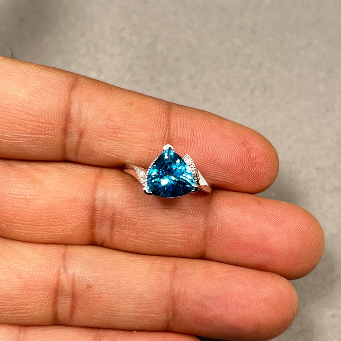 0.02 Ct Diamond & 4.01 Ct 10 mm AAA Trillion Blue Topaz Ring in 14K White Gold