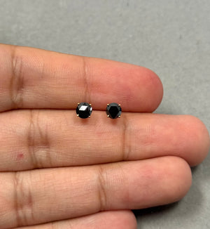 18K yellow gold stud earrings set with two AAA quality round rose cut black diamonds, measuring 3.50–4.00 mm each, secured in four prong settings with push backs, showcasing a total diamond weight of approximately 0.70–0.79 carats. 