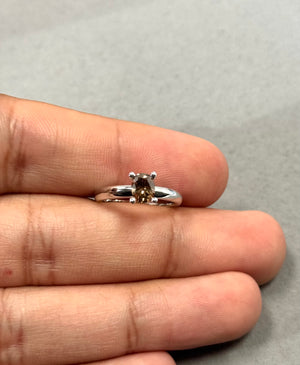 Oval natural brown diamond solitaire ring in 14K white gold with rhodium finish, featuring a 0.48–0.55 carat SI clarity stone in a classic prong setting and a sleek 2.2 mm band designed for elegant everyday wear. 
