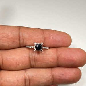 14K white gold ring with black center diamond and white diamond accents