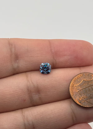 Matching blue gemstone jewelry collection featuring cushion cut moissanite solitaire style