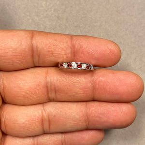 Red and white diamond wedding band in 14K white gold