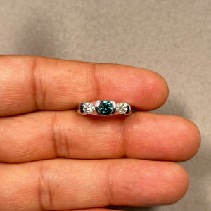 Bezel set teal blue and white diamond 3 stone ring 18k white gold