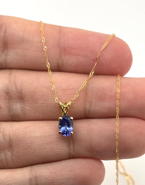 Tanzanite Scroll Pendant 7x5mm Oval AAA in 18K Yellow Gold | Violet Blue Gemstone
