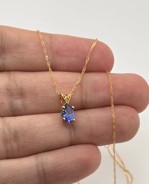 Tanzanite Scroll Pendant 7x5mm Oval AAA in 18K Yellow Gold | Violet Blue Gemstone