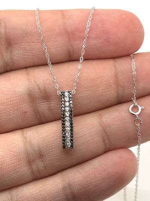 14K white gold pendant with black and white diamonds prong setting black and white diamond pendant 