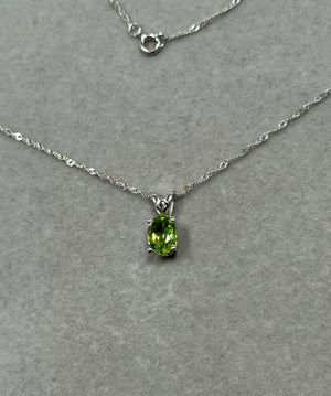 Dainty Peridot Necklace – Oval Gemstone, 14K White Gold Scroll Pendant