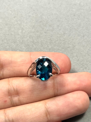 14K white gold ring with 14x10mm oval London Blue Topaz solitaire