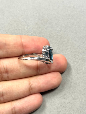 Large oval blue topaz gemstone ring in 14K white gold