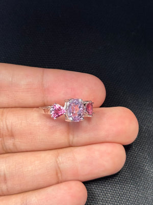 Light pink Kunzite ring with deep pink Tourmaline side stones in 10K white gold