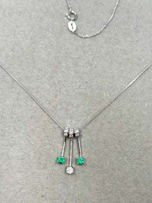 14K white gold necklace with natural emeralds and diamonds