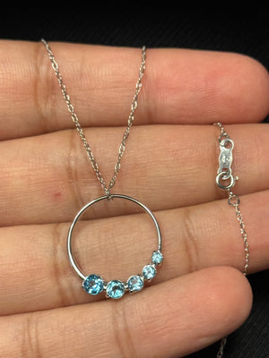 Swiss Blue Topaz Journey Pendant: 14K White Gold Circle Necklace