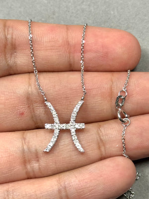 Pisces zodiac diamond pendant in 14K white gold featuring 28 round diamonds in a prong-set constellation design, 0.22–0.28 carat total weight with I–J colour and SI2–I1 clarity. Rhodium-finished pendant with 18 inch cable chain, showcasing a clean symbolic Pisces motif for everyday wear. 