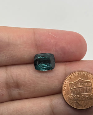 Natural Blue Grey Tourmaline elongated cushion cut gemstone measuring 11x9mm with slightly included clarity, featuring beautiful blue-grey tones for custom rings, pendants, and fine jewelry.