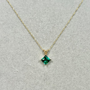 7mm AAA princess cut lab created emerald solitaire pendant necklace in solid 14K yellow gold with Singapore chain, 4-prong secure setting, eye-clean clarity, medium-dark green May birthstone fine jewelry gift for her.