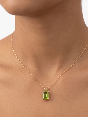 AAA emerald cut Peridot scroll solitaire pendant in 14K yellow gold with chain
