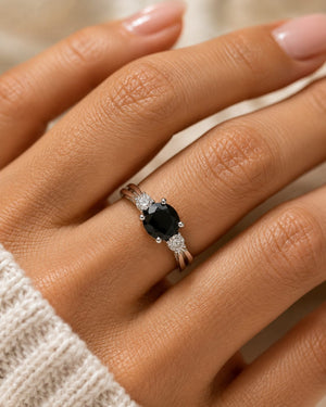Black diamond ring worn on hand for elegant anniversary styling inspiration