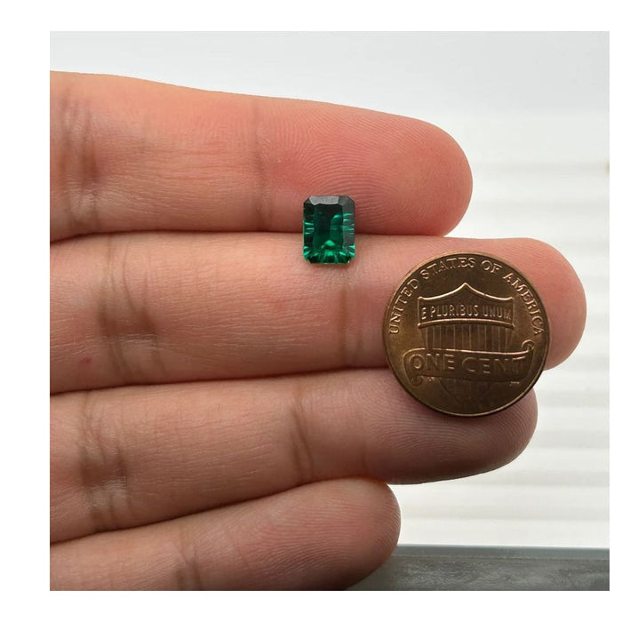 Lab Created Emerald Emerald Concave Cut 8x6mm