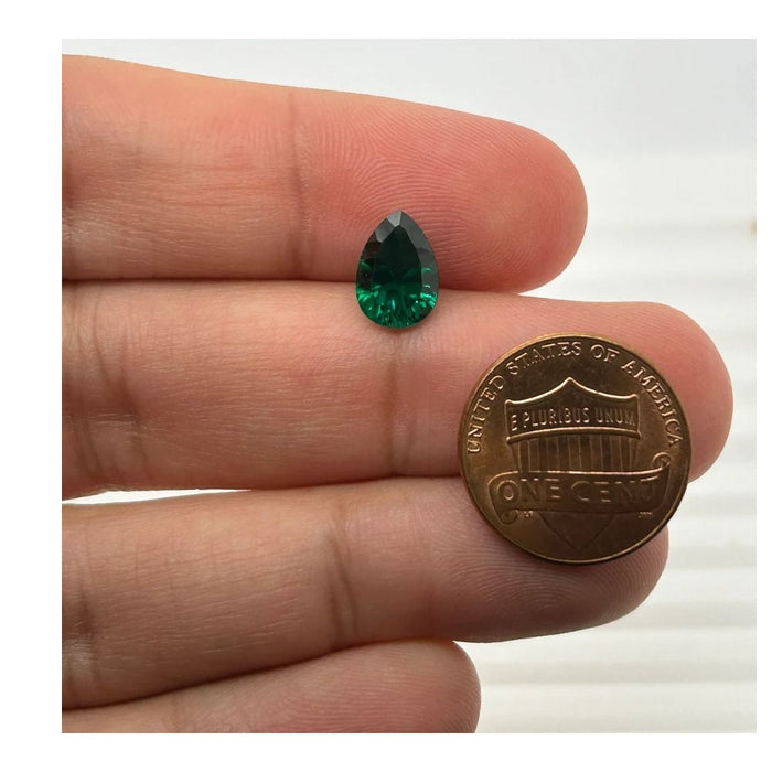 Lab Created Emerald Pear Concave Cut 10x7mm